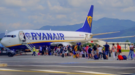 Bergamo,International,Airport.,Loading,Or,Unloading,Passengers',Luggage,On,The